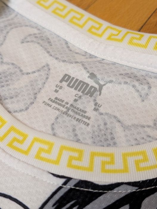 Екип на Италия колаборация с Versace