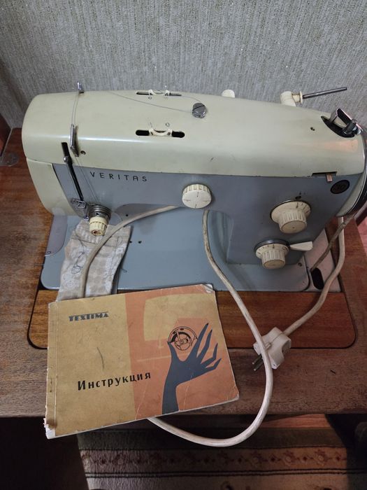 Швейная машина...