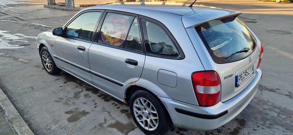 Мазда 323f  с газ