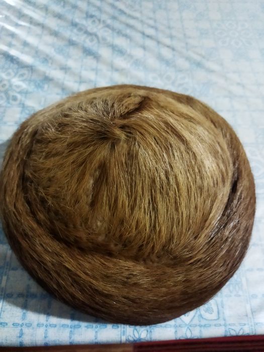 Женская шапка из натурального меха нутрии