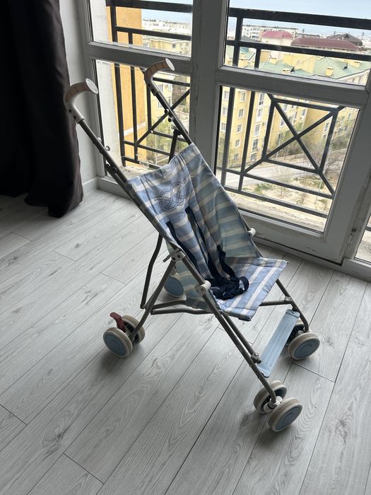 Детская коляска трость