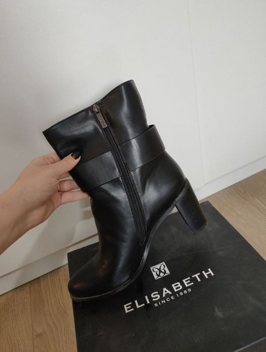 Продам новые сапоги