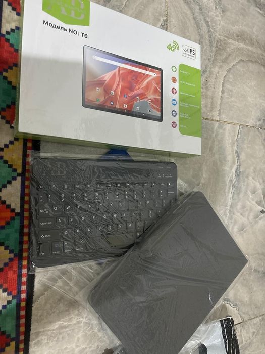 Планшет 50000 тг