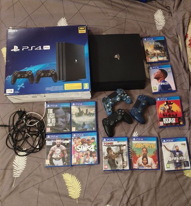 Play Station 4 Pro(ultima versiune) 1Tb+ 3 controllere+ 10 jocuri+accesorii+cutie