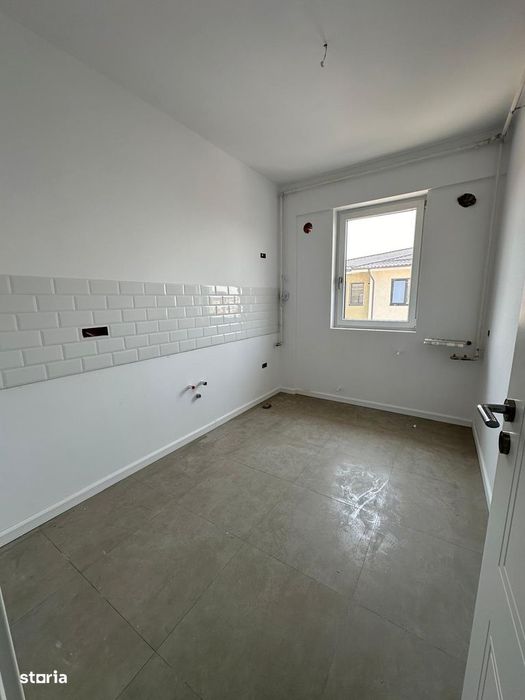 Ap 2 camere cu incalzire in pardoseala + curte proprie + loc parcare
