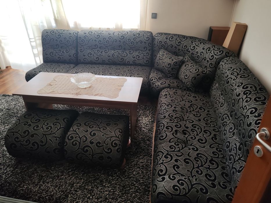 Ъглов диван за хол, фотьойл и две табуретки.