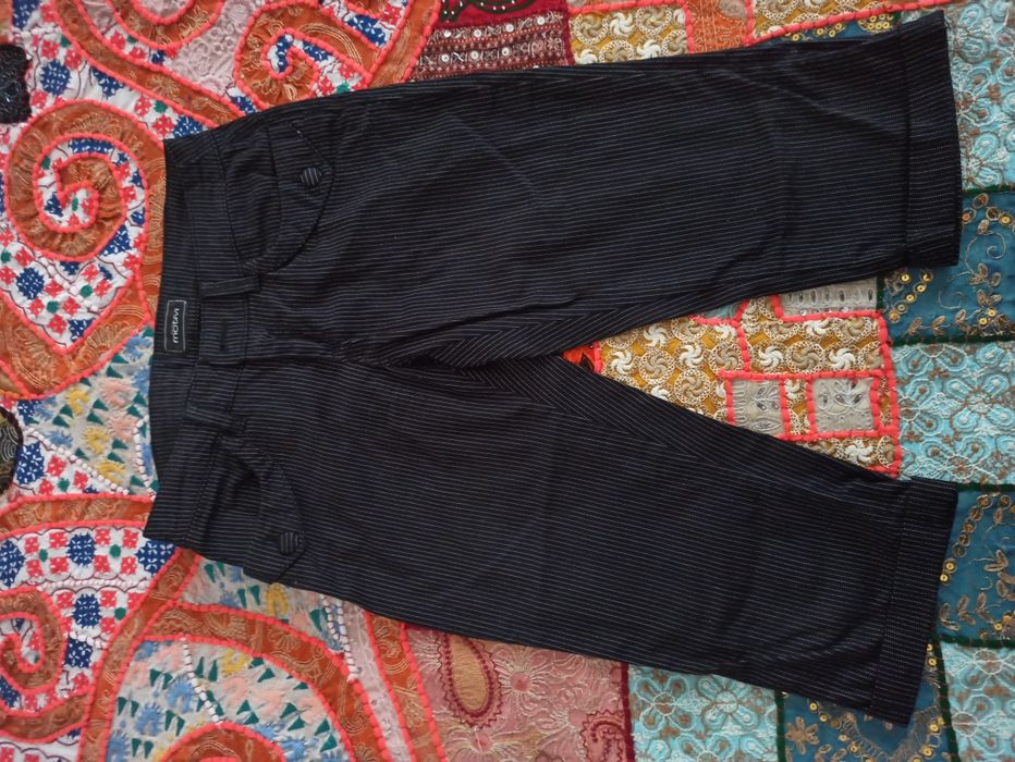 Pantaloni lungi Motivi. Pantaloni scurti Atmosphere