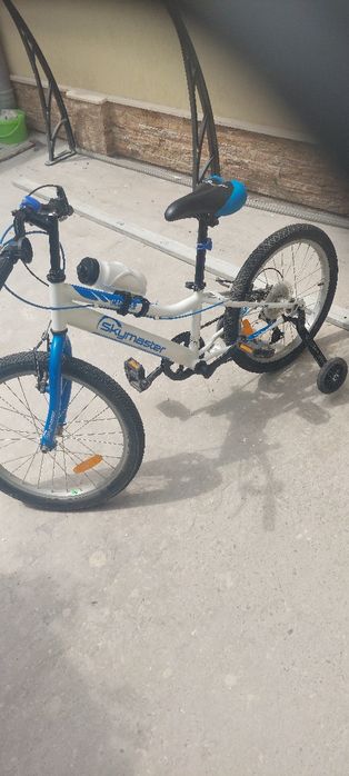 Bicicleta copii  aproape noua