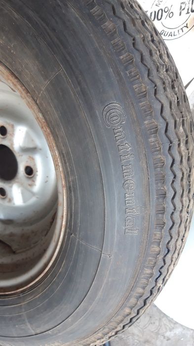 Диск с резиной на трейллер