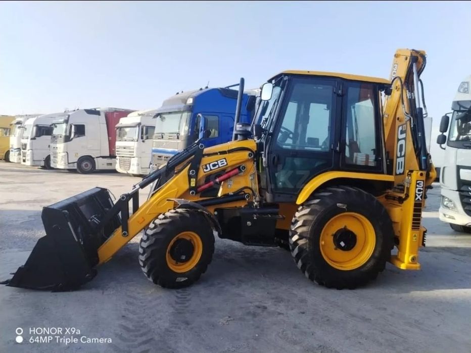 Эксковатор погрузщик