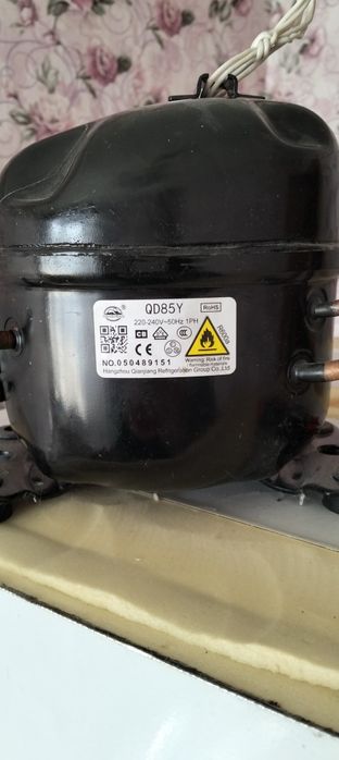 Компрессор холодильника.