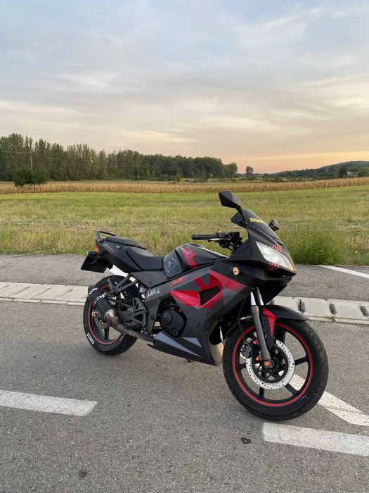 Vând motocicletă kymco quannon 125cc(A1)