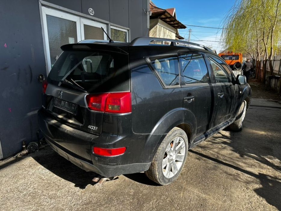 Peugeot 4007 motor 22HDI 4HN euro 4 2009 piese capota far bara geam interior roti jante usa plansa bord navigație GPS