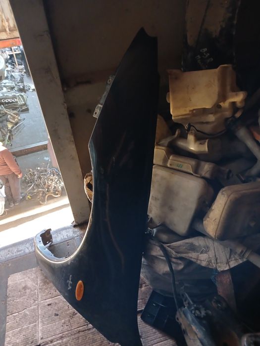 Крыло Мазда 323 седан 1996г в оригинале