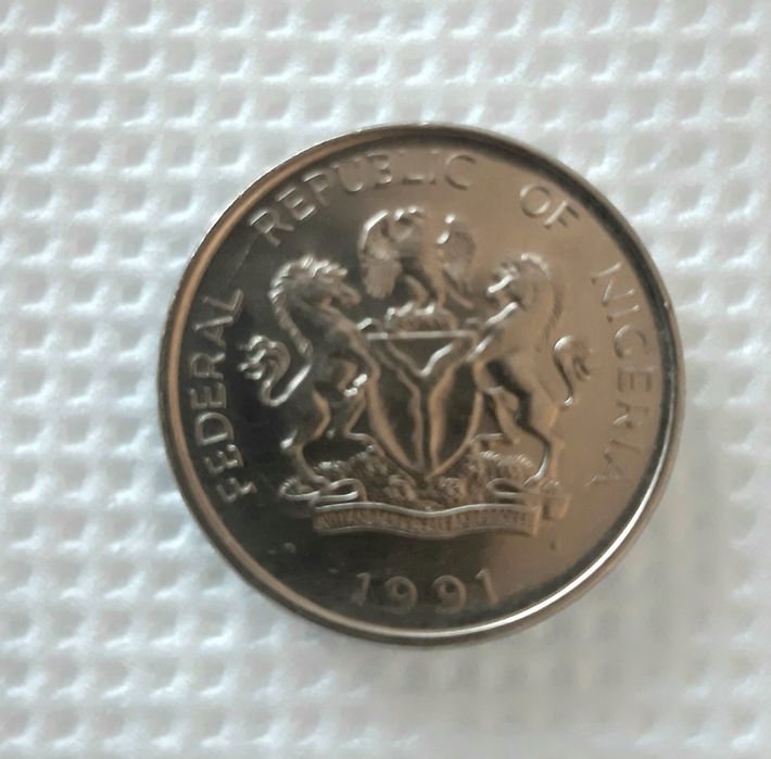 Продам монеты  1 Найра, 1 Цзяо