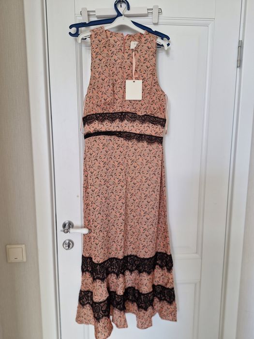 Платье . Новое.  Размер 40(46)