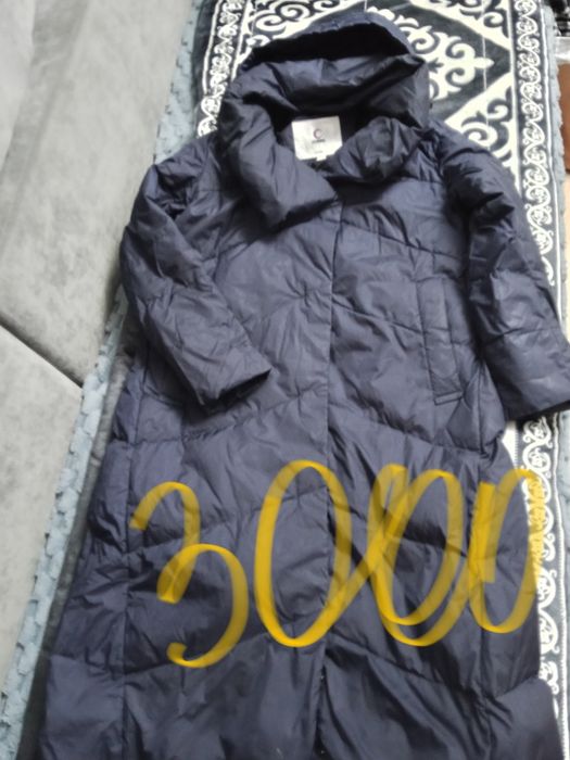 Пуховики женские