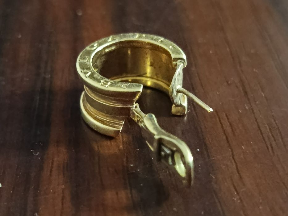 Золотая серьга Bvlgari 750 пробы