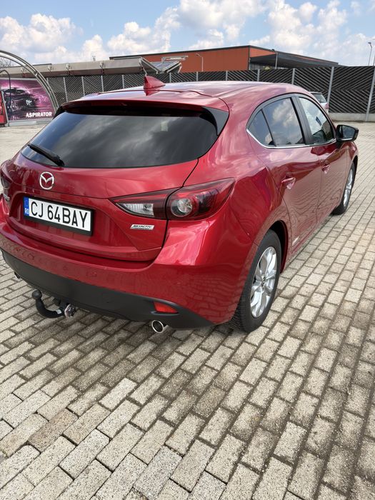 Mazda 3 Top Revolution