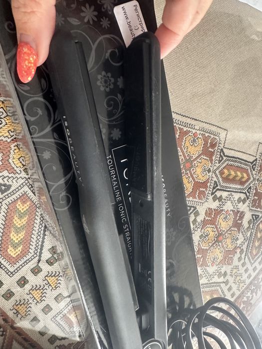 Преса за коса тормалин и йонизация