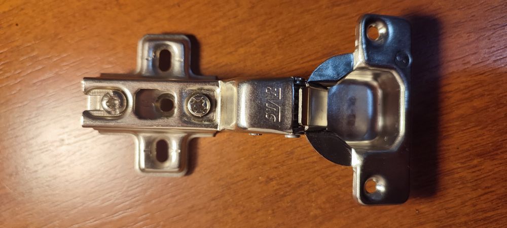 Петли мебельные "Star" с обратной пружиной.