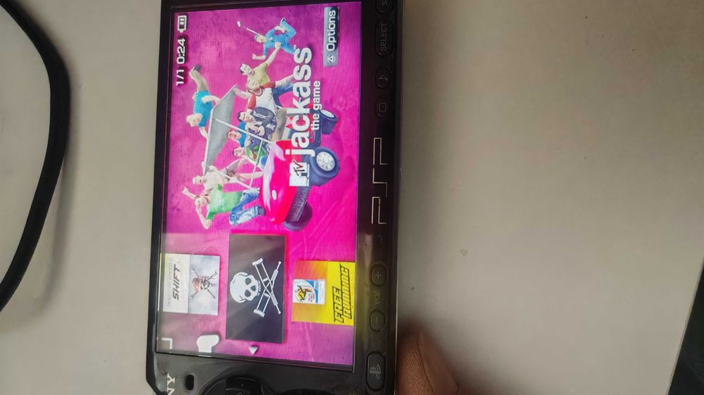 Playstation PSP modat, cu 116 jocuri -vandut