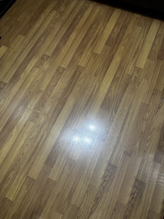 Продам ламинат цвет коричневый  глянцевый