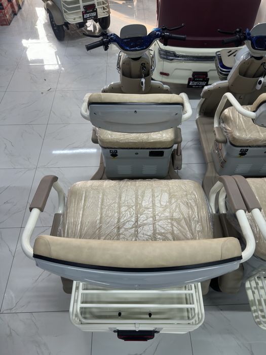 Toza havoda sayr qilish uchun elektro Skuter (трицикл)  yangi model