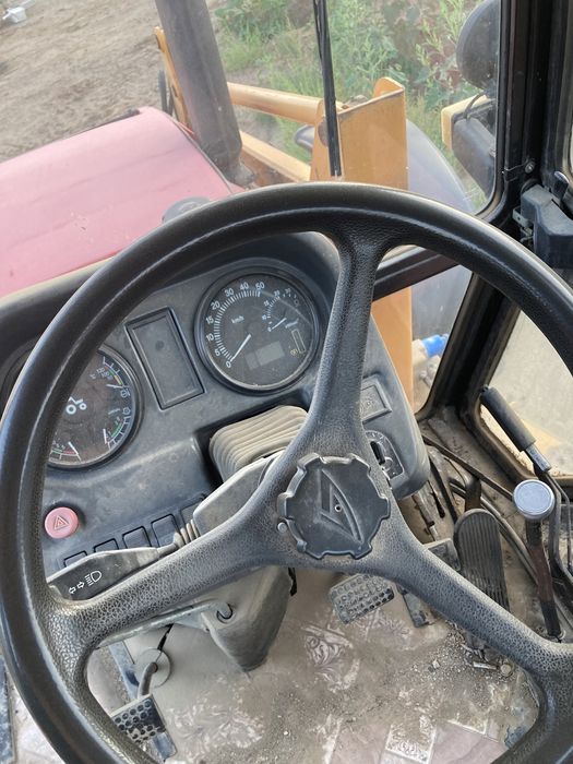 Продам экскаватор погрузчик Амкодор 702Ем