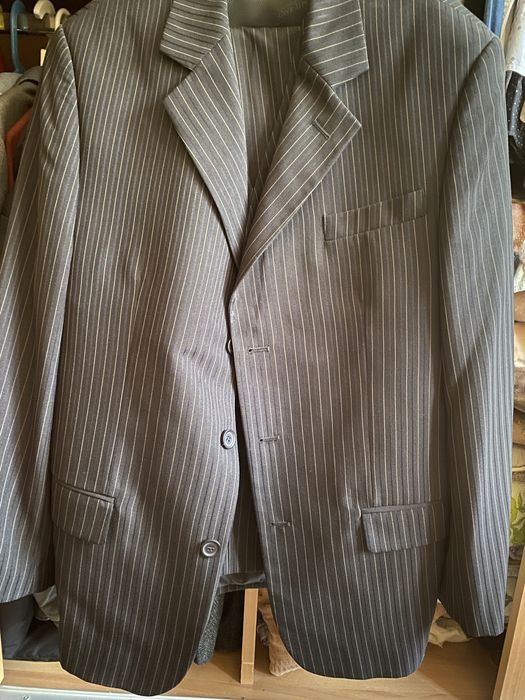 sacou , vesta și pantaloni .