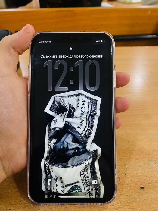 Iphone 11 oq yomkst 100% faqat batare almashgan joyi 128 tali