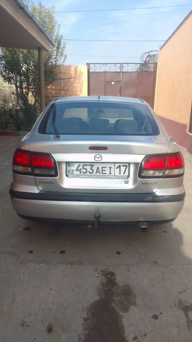 Мазда 626 птичка