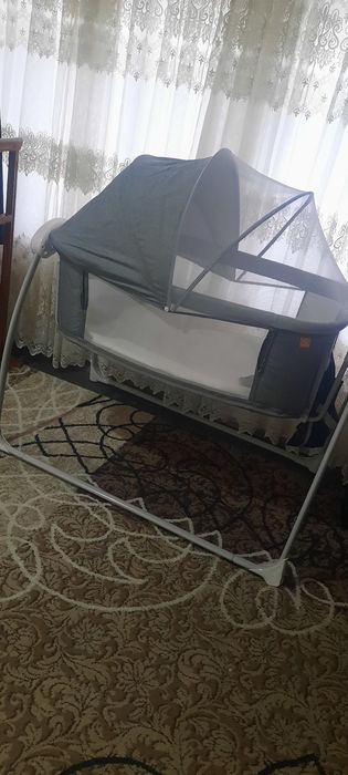 Кроватка с автоукачиванием