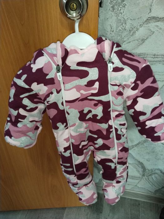 Продам комбинезон теплый