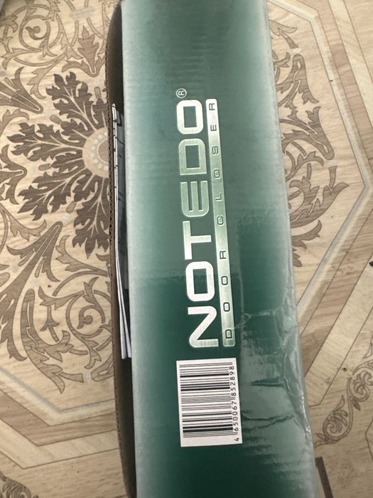 Продам дверной доводчик