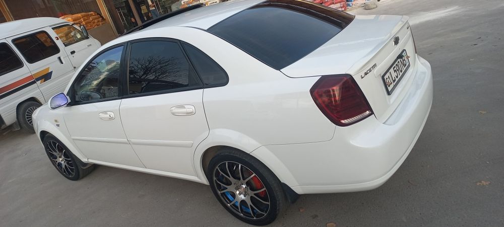 Chevrolet Lacetti / Gentra 2009 — 3