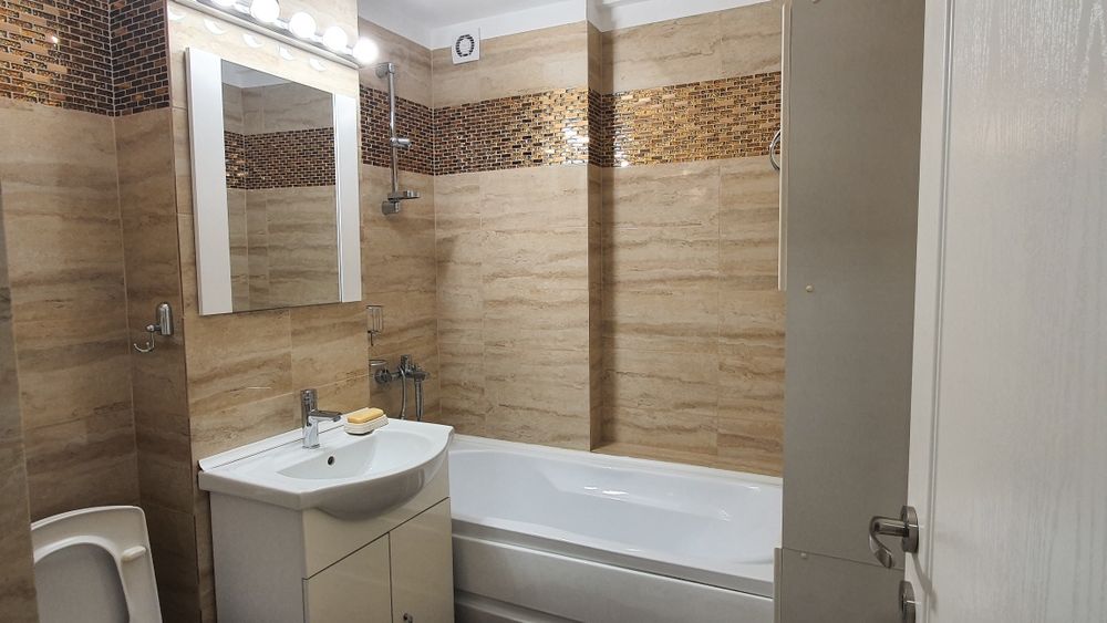 Proprietar inchiriez apartament , loc parcare, plus gradina, 2 camere