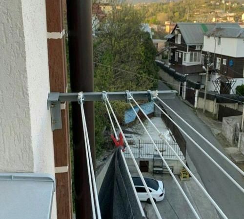 Установка и замена бельевых роликов и кронштейнов (сушилок) для белья