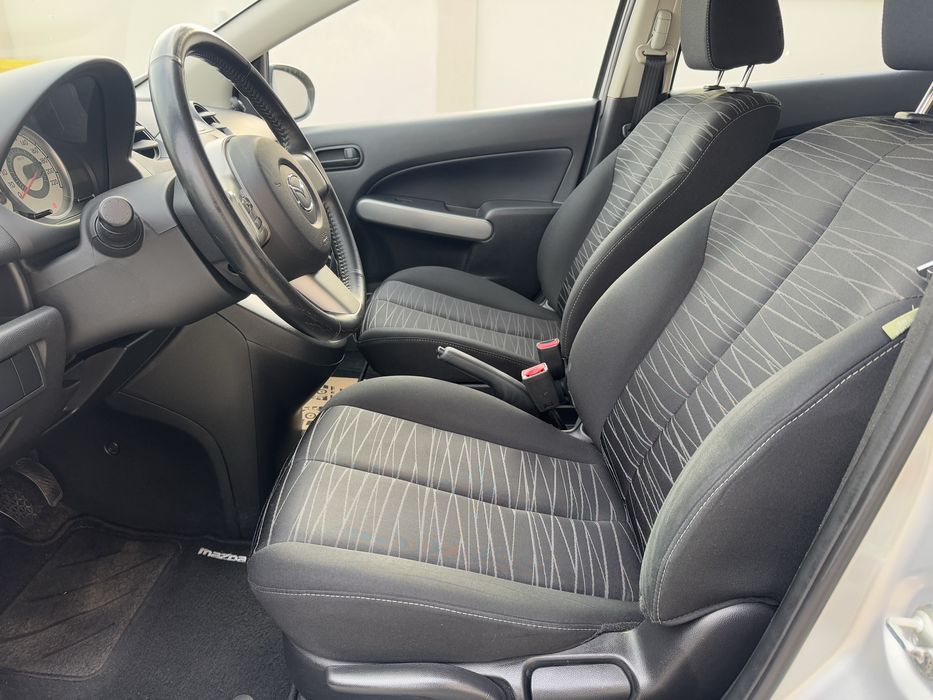 Mazda 2 - 1.4 benzina - 4 usi + Klima - Impecabila - Km putini