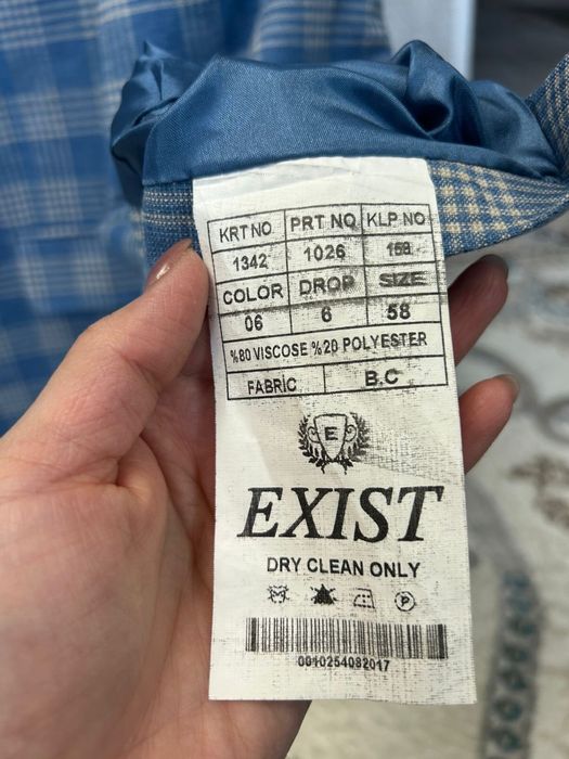 Пиджак в клетку новый