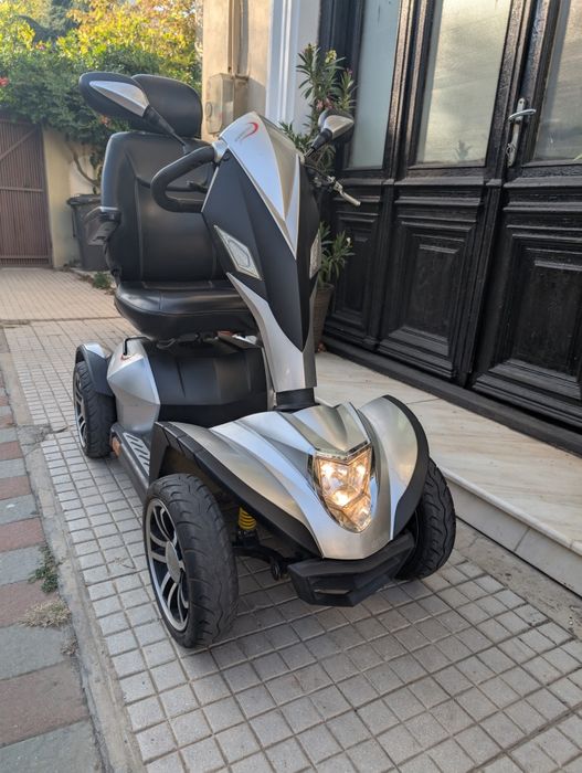 Scutere electrice persoane handicap dizabilitati Pride Kymco Cobra
