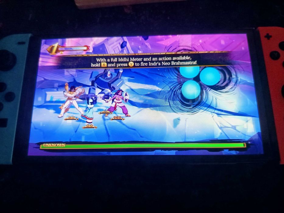 Consola Switch OLED ca noua completa + joc Indivisible, husa, cutie