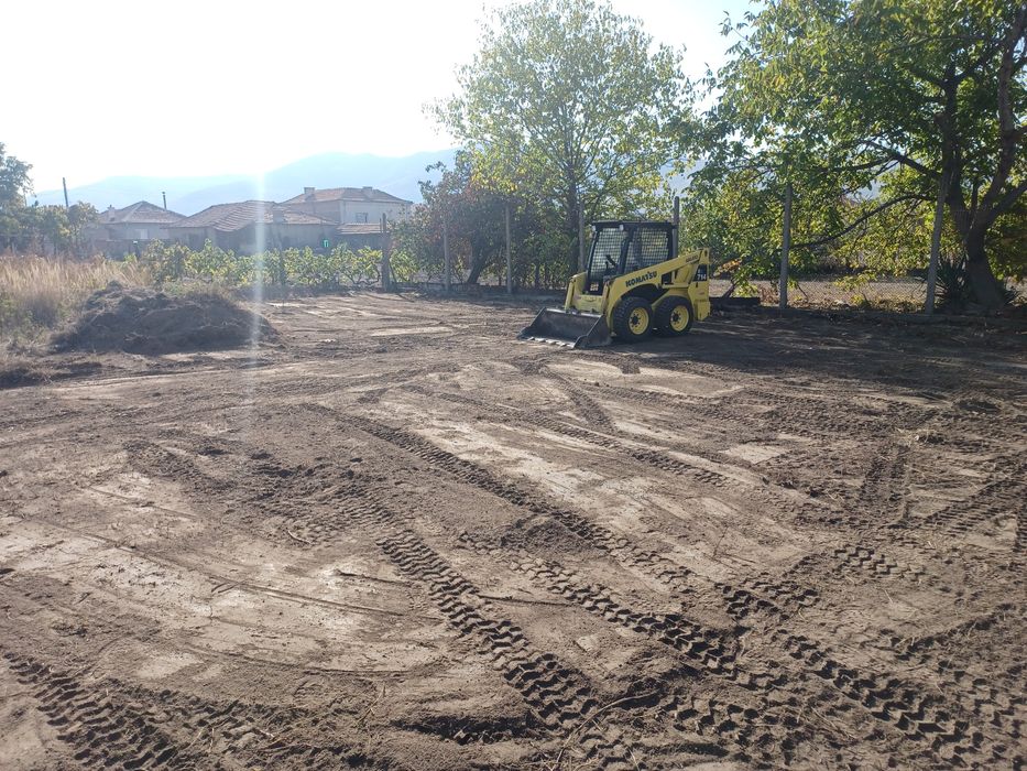 Услуги с бобкат ,самосвал и валяк