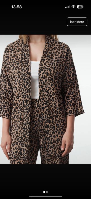 Jerseu animal print  marimea L