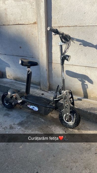 Vand trotineta electrica cu scaun pe lanț!