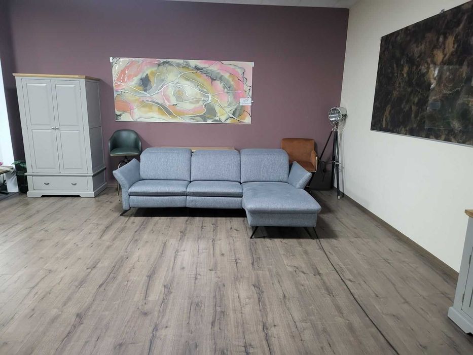 Сив ъглов диван от плат "HUKLA Interliving" с ел. релакс механизъм