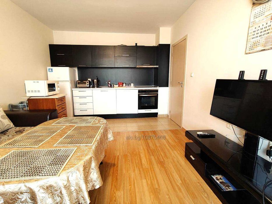 НАЕМ  Двустаен в близост до централния плаж с басейн, комплекс Мелия 1