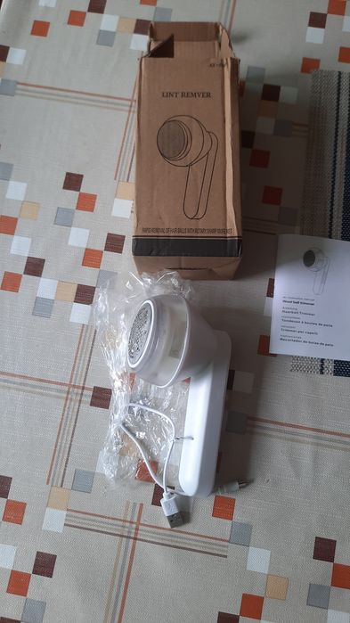 Машинка за отстраняване на мъх и косми