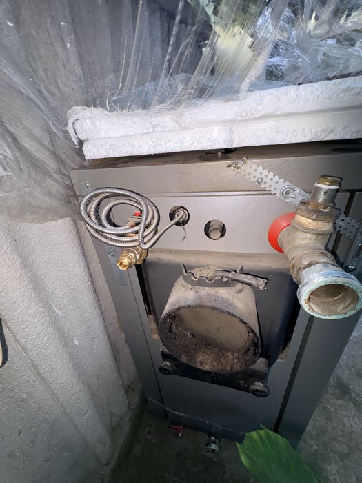 Vând cazan pe lemne Dominus 30kW folosit un sezon cu inca 4 ani garantie