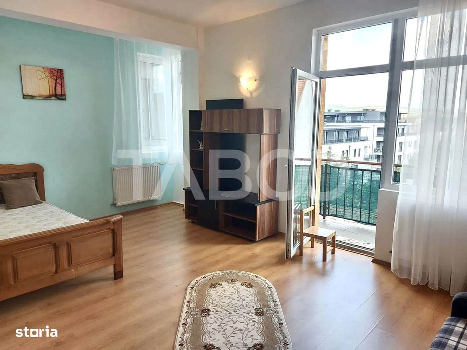 Garsoniera de vanzare zona Garii Semicentrala cu balcon si lift — fotografia 1